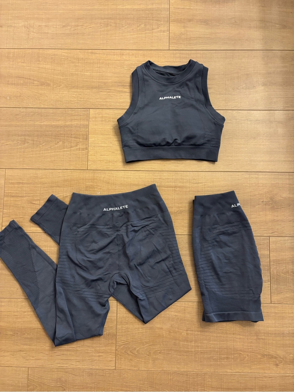 Alphalete woman’s dusty blue Seamless Active Leggings, Crop Top & Shorts Set